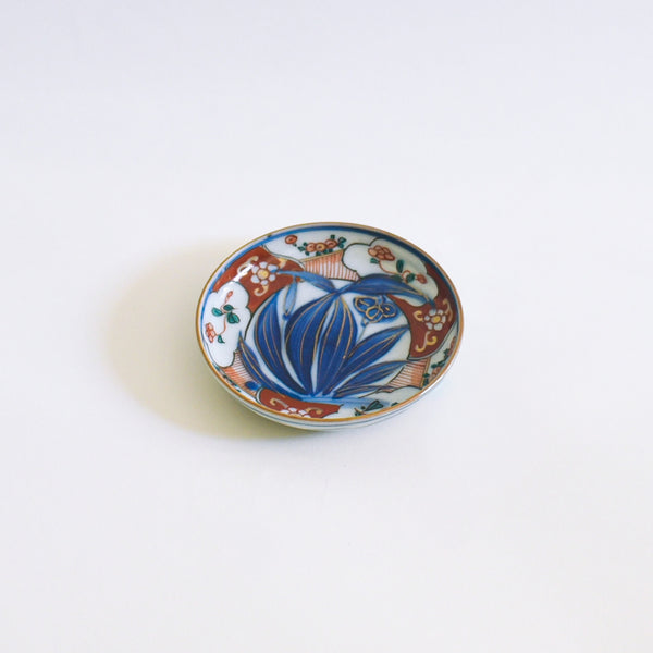 Antique Imari Porcelain Plate with Floral Medallion and Red Ground